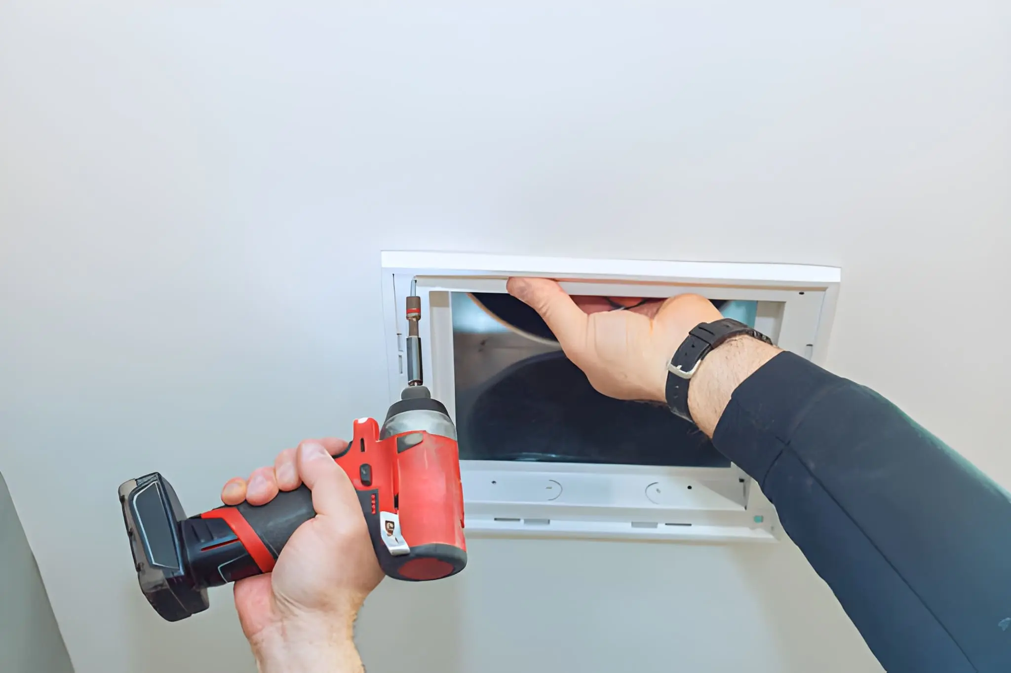 Installing a new vent duct as part of Dryer Vent Repair services